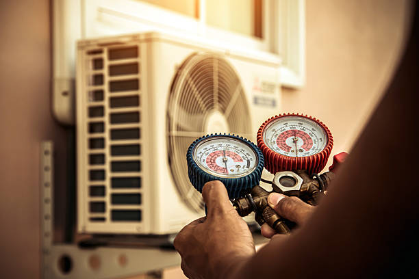 Professional Ductwork Repair technician working in Naples, NC